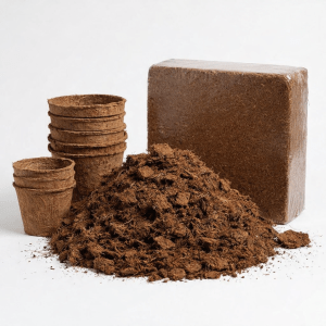 5kg coco peat block next to a pile of loose coco peat and a stack of biodegradable pots